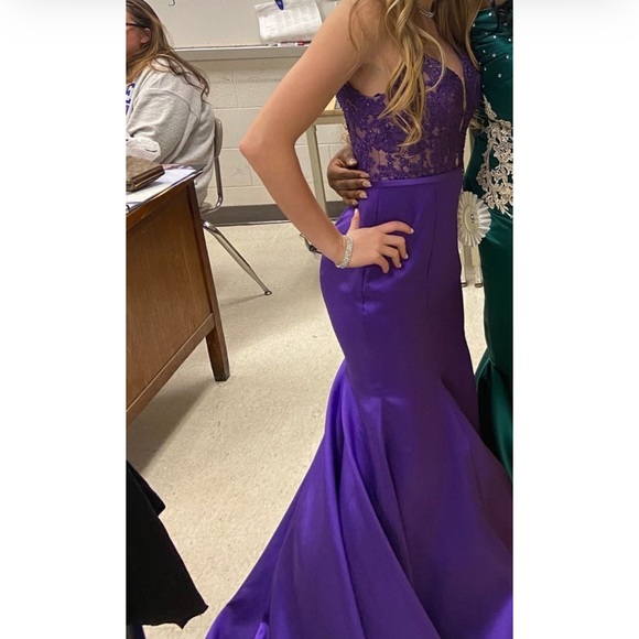 Very pretty purple mermaid dress!
Altered to a 4!
Worn 3 times! - Picture 3 of 4